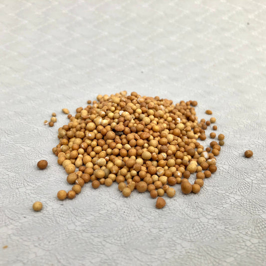 A loose pile of 14-14-14 time release fertilizer