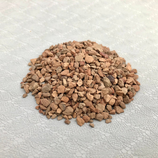 Loose pile of top dressing.
